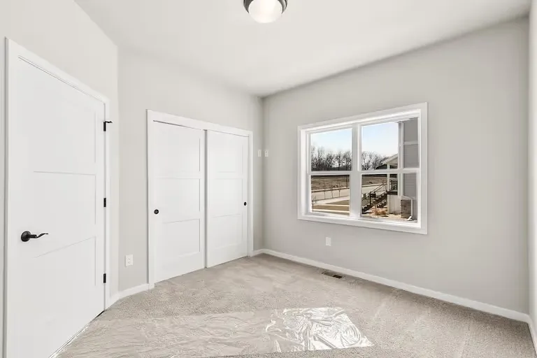 Guest room of a representative Wild Oak ranch home