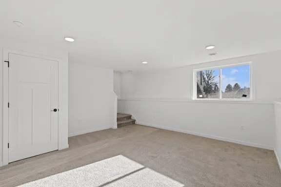 Finished basement with natural light in the Phase 1 model