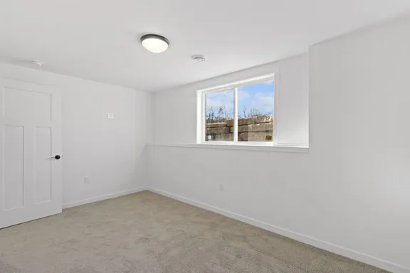 Finished basement living area at Wild Oak
