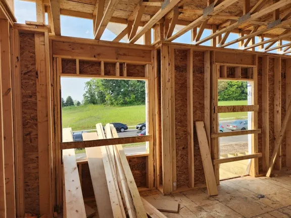 Window and roof framing inside a Phase 1 townhouse