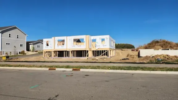 Ranch duplex framing viewed from across the street