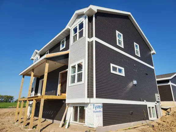 Side exterior finished in the Slate siding color scheme