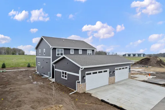Wild Oak townhouse exterior with finished siding