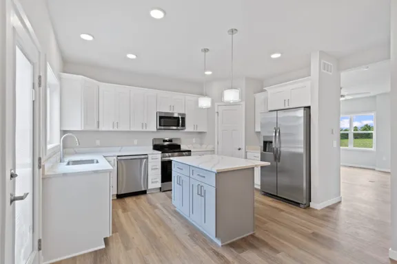 Vogue kitchen cabinetry and countertops at Wild Oak